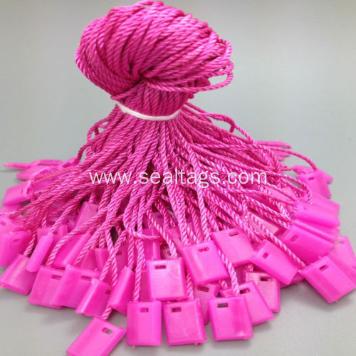 Pink string tag fastener for bag shoes hats